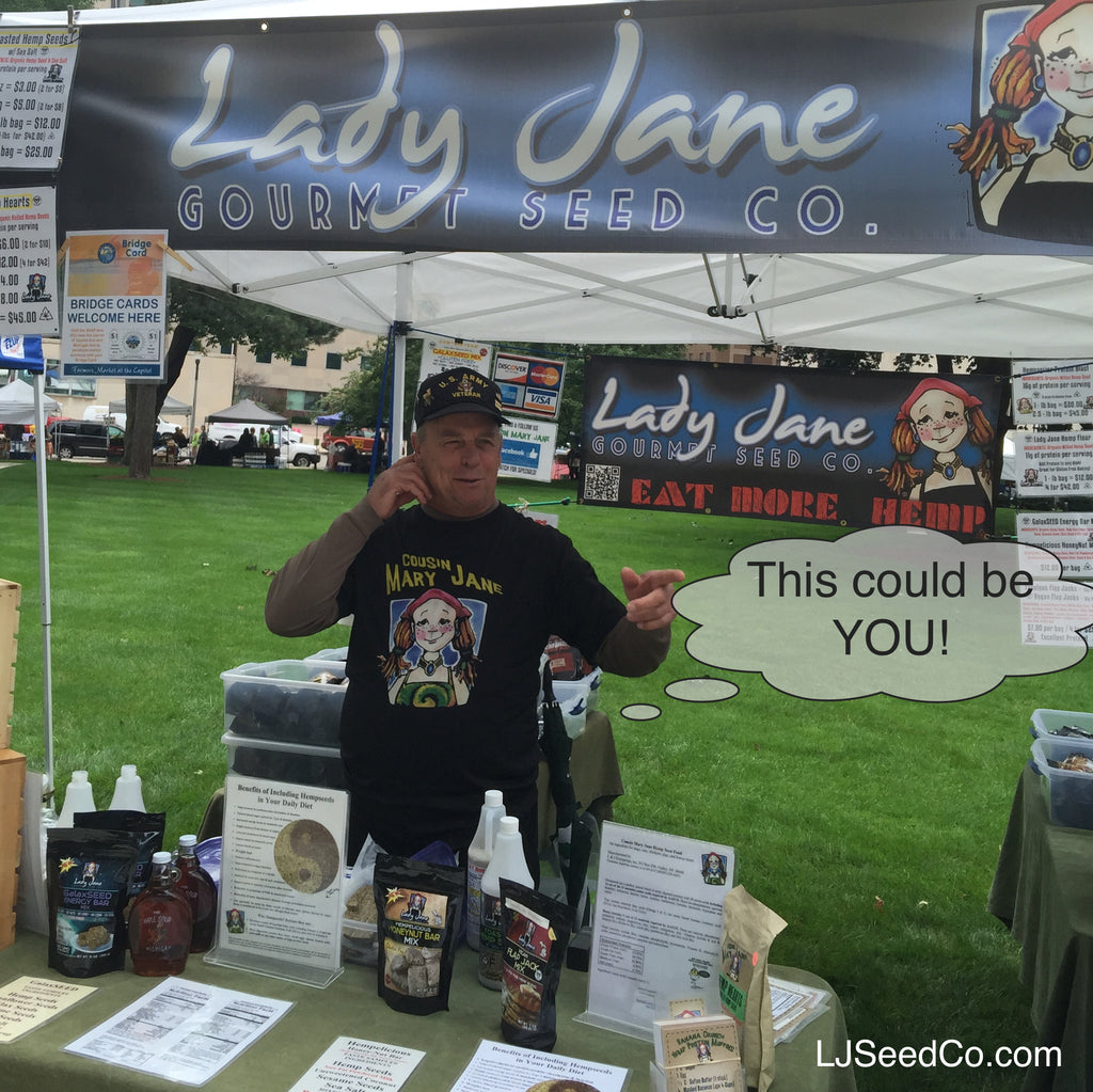 man working at Lady Jane expo booth